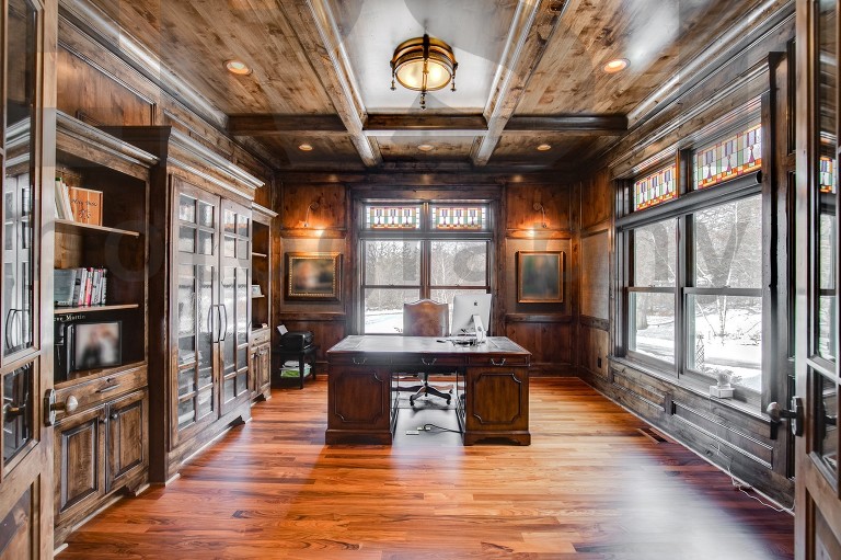 Photo of all wood paneled home office
